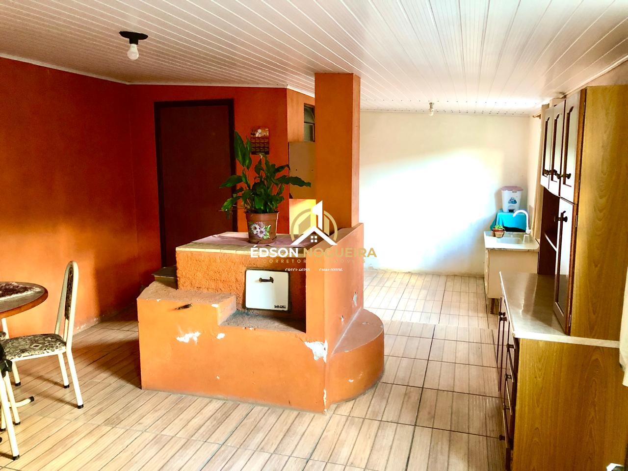 Cozinha com fogão campeiro